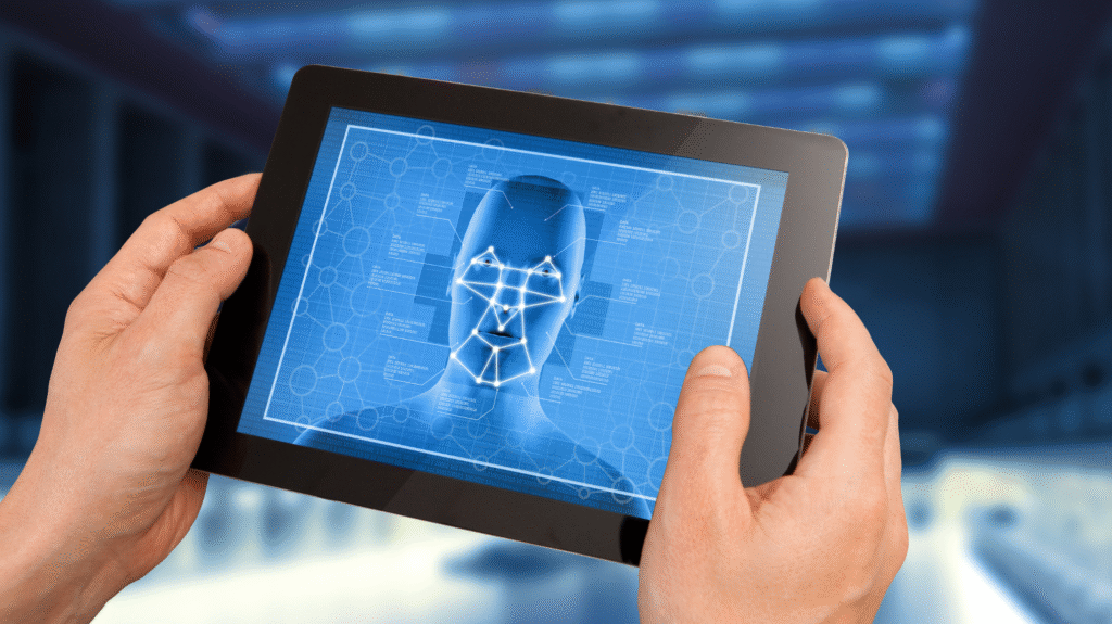 Facial recognition technology on tablet screen with biometric face scan for identity verification and digital security