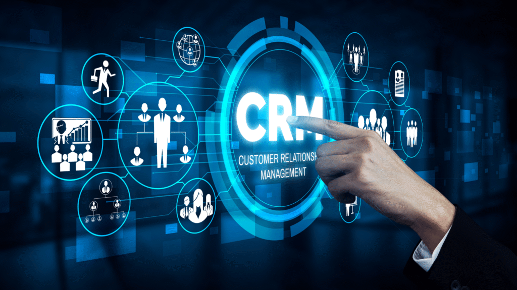 Businessman using digital interface with CRM customer relationship management icons for sales, marketing, and customer data management
